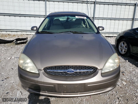 2002 Ford Taurus SEL Deluxe with VIN 1FAHP56S92G122795, listed as a Copart auction lot 73642794 with 82,785 mi miles and Salvage Title. Bid and sale history available at carsss.com. Image 5.