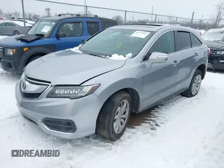 2017 Acura RDX w/Technology Pkg with VIN 5J8TB4H58HL031488, listed as a IAAI auction lot 41274882 with 124,066 mi miles. Bid and sale history available at carsss.com. Image 2.