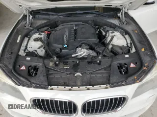 2013 BMW 7 Series 740i with VIN WBAYA6C5XDD143639, listed as a Copart auction lot 62296694 with 97,082 mi miles and Salvage Title. Bid and sale history available at carsss.com. Image 11.