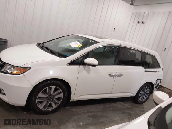 2015 Honda Odyssey Touring Elite with VIN 5FNRL5H92FB020159, listed as a IAAI auction lot 42103240 with 79,322 mi miles and . Bid and sale history available at DreamBid. Image 15.