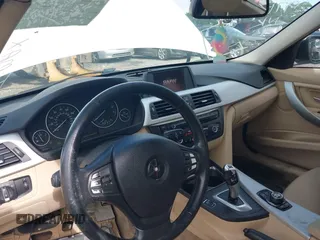 2013 BMW 3 Series 328i с VIN WBA3A5G52DNP23542, выставлен на аукционе IAAI как лот 42599708 с пробегом 169 081 миль миль и . История ставок и продаж доступна на DreamBid. Изображение 5.