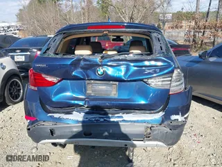 2013 BMW X1 28i with VIN WBAVM1C52DVW46153, listed as a IAAI auction lot 41236419 with 160,732 mi miles. Bid and sale history available at carsss.com. Image 16.