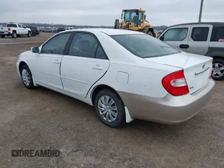 2004 Toyota Camry LE with VIN 4T1BF32K14U067269, listed as a IAAI auction lot 41528507 with 208,346 mi miles. Bid and sale history available at carsss.com. Image 3.