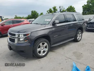2017 Chevrolet Tahoe LS with VIN 1GNSKAKC1HR387687, listed as a Copart auction lot 58974185 with 124,717 mi miles and Salvage title. Bid and sale history available at DreamBid. Image 1.