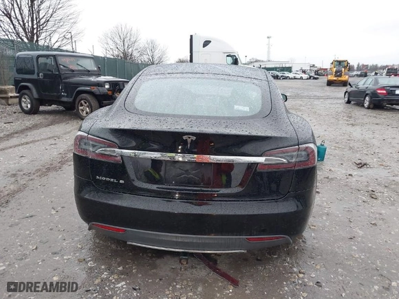 2013 Tesla Model S with VIN 5YJSA1DN9DFP03380, listed as a IAAI auction lot 41865213 with 184,831 mi miles. Bid and sale history available at carsss.com. Image 16.