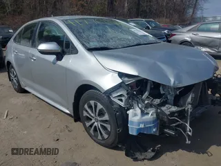 2022 Toyota Corolla Hybrid LE with VIN JTDEAMDE6NJ045056, listed as a IAAI auction lot 41770162 with 20,176 mi miles. Bid and sale history available at carsss.com. Image 1.