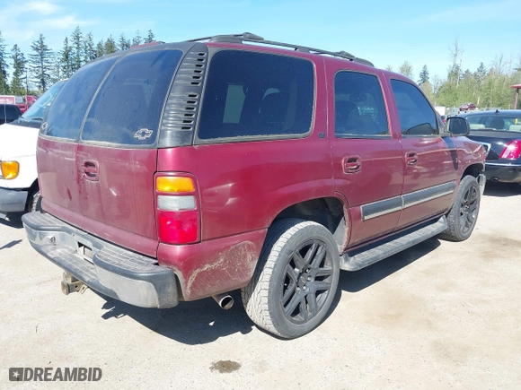 2001 Chevrolet Tahoe LS with VIN 1GNEK13T61J251300, listed as a IAAI auction lot 42071879 with 193,300 mi miles. Bid and sale history available at carsss.com. Image 4.