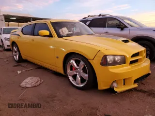 2007 Dodge Charger SRT-8 with VIN 2B3KA73W97H662391, listed as a Copart auction lot 82000474 with 141,721 mi miles and Salvage Title. Bid and sale history available at DreamBid. Image 4.