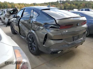 2020 BMW X6 xDrive40i z VIN 5UXCY6C07L9C74754, wystawiony jako Copart lot #62235632 z przebiegiem Nie podano mil oraz . Historia ofert i sprzedaży dostępna na DreamBid. Obrazek 3.