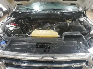 2021 Ford F-150 XL z VIN 1FTFW1E50MFA23431, wystawiony jako Copart lot #51638895 z przebiegiem 51 473 mil mil oraz Szkoda całkowita • Salvage title. Historia ofert i sprzedaży dostępna na DreamBid. Obrazek 11.