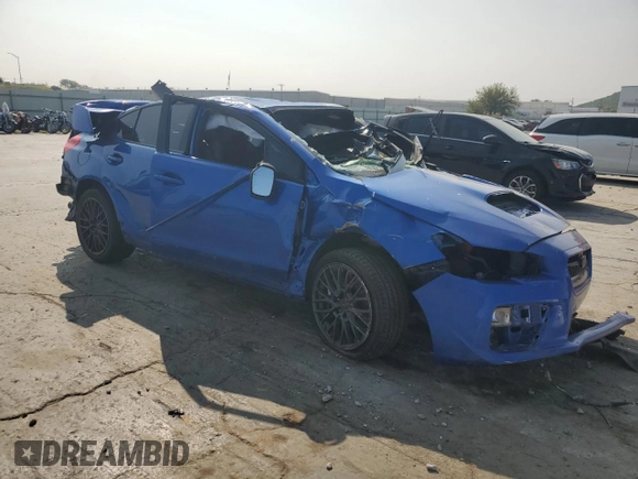 2015 Subaru WRX STI with VIN JF1VA2L66F9804795, listed as a Copart auction lot 71095344 with 141,122 mi miles and Salvage title. Bid and sale history available at DreamBid. Image 4.