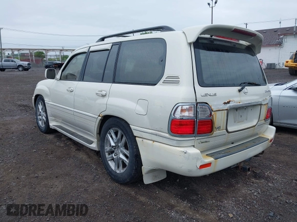 2000 Lexus LX 470 z VIN JT6HT00W8Y0096929, wystawiony jako IAAI lot #42316574 z przebiegiem 227 839 mil mil oraz . Historia ofert i sprzedaży dostępna na DreamBid. Obrazek 3.