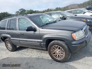 2004 Jeep Grand Cherokee Limited with VIN 1J8GW58N14C391912, listed as a IAAI auction lot 41706729 with 248,806 mi miles. Bid and sale history available at carsss.com. Image 13.