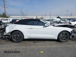 2020 Ford Mustang EcoBoost z VIN 1FATP8UH0L5134222, wystawiony jako IAAI lot #41477417 z przebiegiem 40 698 mil mil oraz . Historia ofert i sprzedaży dostępna na DreamBid. Obrazek 19.