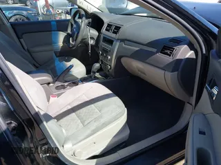 2012 Ford Fusion SE z VIN 3FAHP0HA1CR130424, wystawiony jako IAAI lot #42268004 z przebiegiem 161 898 mil mil oraz . Historia ofert i sprzedaży dostępna na DreamBid. Obrazek 5.