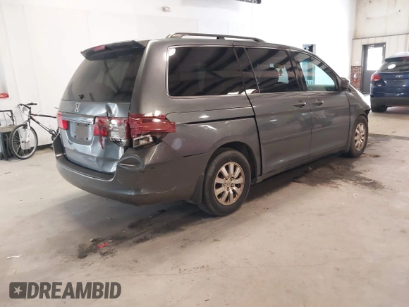 2010 Honda Odyssey EX-L with VIN 5FNRL3H7XAB080170, listed as a IAAI auction lot 41241879 with 221,272 mi miles. Bid and sale history available at carsss.com. Image 4.