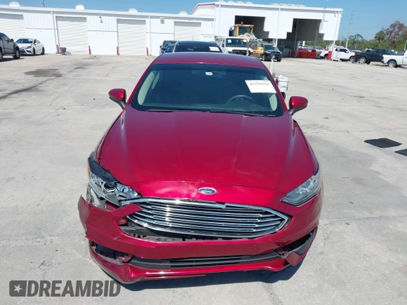 2018 Ford Fusion SE z VIN 3FA6P0LU9JR279976, wystawiony jako IAAI lot #41792558 z przebiegiem 115 790 mil mil oraz . Historia ofert i sprzedaży dostępna na DreamBid. Obrazek 12.