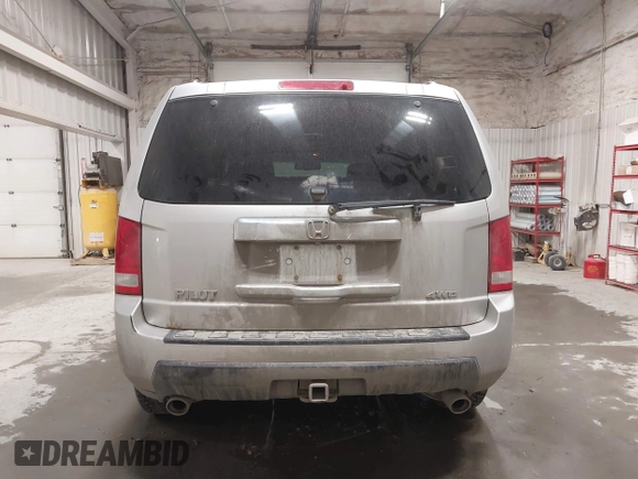 2011 Honda Pilot EX-L with VIN 5FNYF4H66BB029802, listed as a IAAI auction lot 42101545 with 240,127 mi miles and . Bid and sale history available at carsss.com. Image 16.