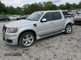 2010 Ford Explorer Sport Trac with VIN 1FMEU2D86AUA04257, listed as a Copart auction lot 60132315 with 116,941 mi miles and Salvage title. Bid and sale history available at DreamBid. Image 1.