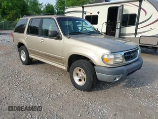 1999 Ford Explorer XLT z VIN 1FMZU34E3XUA80301, wystawiony jako IAAI lot #42094304 z przebiegiem 145 373 mil mil oraz . Historia ofert i sprzedaży dostępna na DreamBid. Obrazek 1.