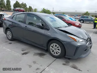 2019 Toyota Prius L Eco with VIN JTDKARFU9K3075219, listed as a IAAI auction lot 42113323 with 218,986 mi miles. Bid and sale history available at carsss.com. Image 1.