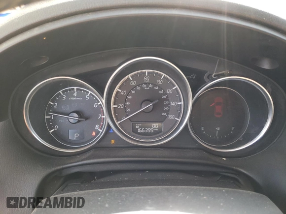2016 Mazda CX-5 Touring with VIN JM3KE2CY7G0657113, listed as a Copart auction lot 46489835 with 166,399 mi miles and Salvage Title. Bid and sale history available at DreamBid. Image 9.
