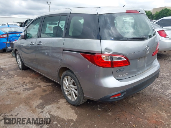 2012 Mazda 5 Sport with VIN JM1CW2BL0C0111151, listed as a IAAI auction lot 42359887 with 158,986 mi miles and . Bid and sale history available at DreamBid. Image 3.