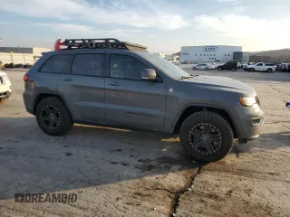 2020 Jeep Grand Cherokee Trailhawk with VIN 1C4RJFLT9LC430514, listed as a Copart auction lot 85311924 with 170,554 mi miles and Salvage title. Bid and sale history available at DreamBid. Image 4.