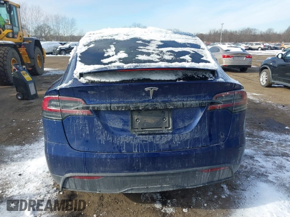 2022 Tesla Model X Plaid z VIN 7SAXCBE69NF343318, wystawiony jako IAAI lot #41387403 z przebiegiem Nie podano mil oraz . Historia ofert i sprzedaży dostępna na DreamBid. Obrazek 16.