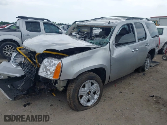 2011 GMC Yukon SLT z VIN 1GKS1CE00BR242127, wystawiony jako IAAI lot #42271949 z przebiegiem Nie podano mil oraz . Historia ofert i sprzedaży dostępna na DreamBid. Obrazek 17.