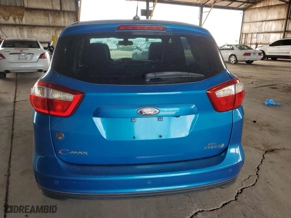 2013 Ford C-Max Hybrid SEL with VIN 1FADP5BUXDL526964, listed as a Copart auction lot 52782485 with 128,671 mi miles and Salvage Title. Bid and sale history available at carsss.com. Image 6.