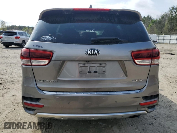 2016 Kia Sorento SX with VIN 5XYPKDA50GG102302, listed as a Copart auction lot 51638385 with 101,063 mi miles and Salvage Title. Bid and sale history available at carsss.com. Image 6.