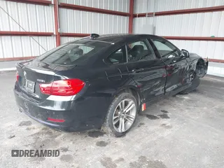 2015 BMW 4 Series 428i xDrive with VIN WBA4C9C57FD331872, listed as a IAAI auction lot 42276675 with 106,543 mi miles and . Bid and sale history available at DreamBid. Image 4.