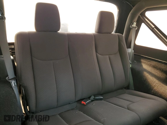 2015 Jeep Wrangler Freedom Edition with VIN 1C4AJWAG8FL688255, listed as a Copart auction lot 59722165 with 130,666 mi miles and Salvage title. Bid and sale history available at DreamBid. Image 11.