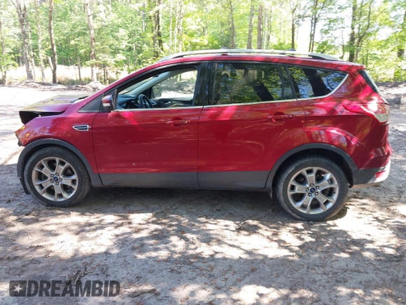 2014 Ford Escape Titanium with VIN 1FMCU9JX7EUB68165, listed as a IAAI auction lot 42141235 with 172,041 mi miles and . Bid and sale history available at DreamBid. Image 15.
