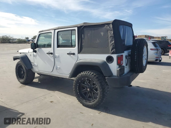 2018 Jeep Wrangler JK Unlimited Sport S with VIN 1C4BJWDG7JL865323, listed as a Copart auction lot 82657514 with 15,408 mi miles and Salvage Title. Bid and sale history available at carsss.com. Image 2.