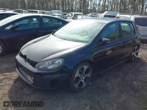 2010 Volkswagen GTI with VIN WVWGD7AJ8AW110814, listed as a IAAI auction lot 41916110 with 173,029 mi miles and . Bid and sale history available at DreamBid. Image 2.