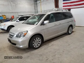 2005 Honda Odyssey Touring z VIN 5FNRL38875B111129, wystawiony jako Copart lot #60115855 z przebiegiem 183 052 mil mil oraz Czysty tytuł • Clean title. Historia ofert i sprzedaży dostępna na DreamBid. Obrazek 1.