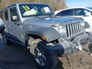 2015 Jeep Wrangler Unlimited Sport with VIN 1C4BJWDG4FL732123, listed as a IAAI auction lot 41864714 with 142,382 mi miles. Bid and sale history available at carsss.com. Image 1.