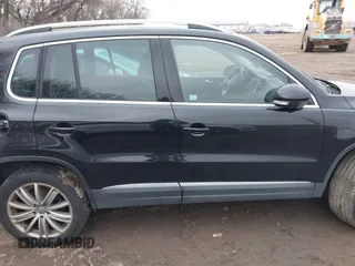 2016 Volkswagen Tiguan S with VIN WVGBV7AXXGW581315, listed as a IAAI auction lot 41495812 with 180,061 mi miles and . Bid and sale history available at DreamBid. Image 13.