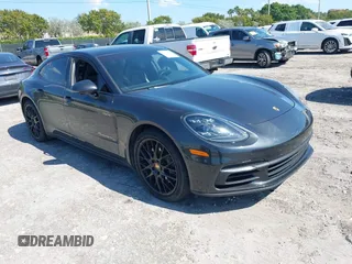 2020 Porsche Panamera 4 E-Hybrid z VIN WP0AE2A79LL132755, wystawiony jako IAAI lot #42040868 z przebiegiem 34 567 mil mil oraz . Historia ofert i sprzedaży dostępna na DreamBid. Obrazek 1.