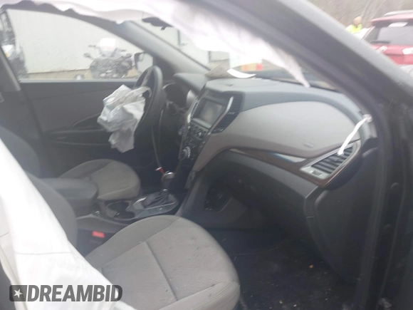 2018 Hyundai Santa Fe 2.4L z VIN 5NMZUDLB7JH098638, wystawiony jako IAAI lot #42055793 z przebiegiem 63 516 mil mil oraz . Historia ofert i sprzedaży dostępna na DreamBid. Obrazek 5.