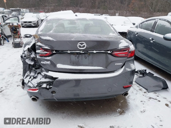 2019 Mazda 6 Grand Touring with VIN JM1GL1TYXK1505988, listed as a IAAI auction lot 41520952 with 70,032 mi miles and . Bid and sale history available at carsss.com. Image 17.