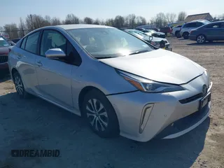 2021 Toyota Prius LE z VIN JTDL9MFU1M3023280, wystawiony jako IAAI lot #42106803 z przebiegiem 39 657 mil mil oraz . Historia ofert i sprzedaży dostępna na DreamBid. Obrazek 1.