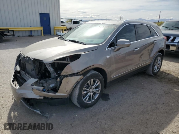 2022 Cadillac XT5 FWD Premium Luxury z VIN 1GYKNCRS9NZ180043, wystawiony jako Copart lot #51352195 z przebiegiem 12 399 mil mil oraz Szkoda całkowita • Salvage title. Historia ofert i sprzedaży dostępna na DreamBid. Obrazek 1.