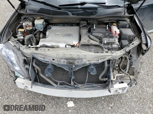 2011 Lexus RX 450h with VIN JTJBC1BA5B2040901, listed as a Copart auction lot 61205235 with 120,740 mi miles and Salvage title. Bid and sale history available at DreamBid. Image 12.