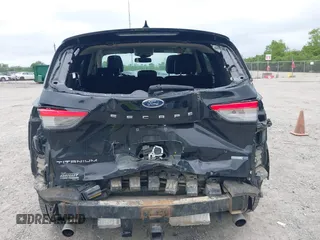 2020 Ford Escape Titanium with VIN 1FMCU9J97LUA35212, listed as a IAAI auction lot 42347274 with 50,419 mi miles and . Bid and sale history available at DreamBid. Image 17.
