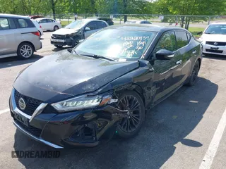 2020 Nissan Maxima SL with VIN 1N4AA6DV5LC366300, listed as a IAAI auction lot 42220939 with 16,858 mi miles and . Bid and sale history available at DreamBid. Image 6.