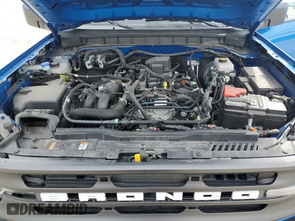 2023 Ford Bronco z VIN 1FMDE5BH7PLB11989, wystawiony jako Copart lot #58302125 z przebiegiem 25 526 mil mil oraz Szkoda całkowita • Salvage title. Historia ofert i sprzedaży dostępna na DreamBid. Obrazek 12.