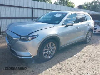 2020 Mazda CX-9 Grand Touring with VIN JM3TCADY2L0406173, listed as a IAAI auction lot 42217230 with 110,465 mi miles and . Bid and sale history available at DreamBid. Image 2.